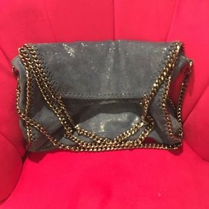 purse with chain trim
